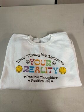 White Crewneck Sweatshirt with Multicolor 'Your Reality' Graphic